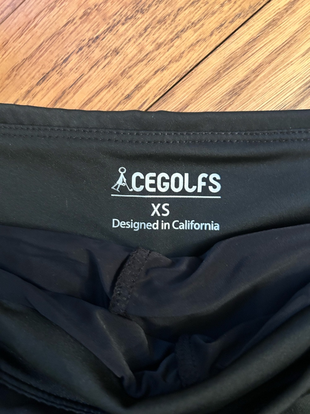 Women's Black Ruffle Hem Golf Skort with Zip Pockets - Picture 3 of 5